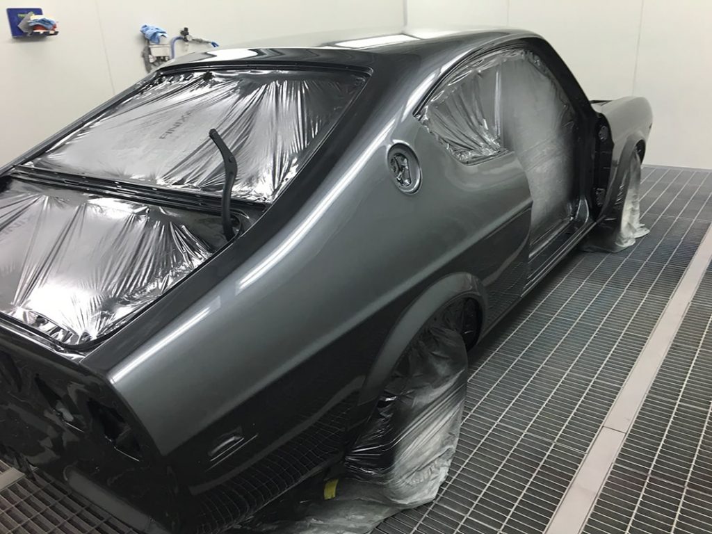 Spray painting coat black