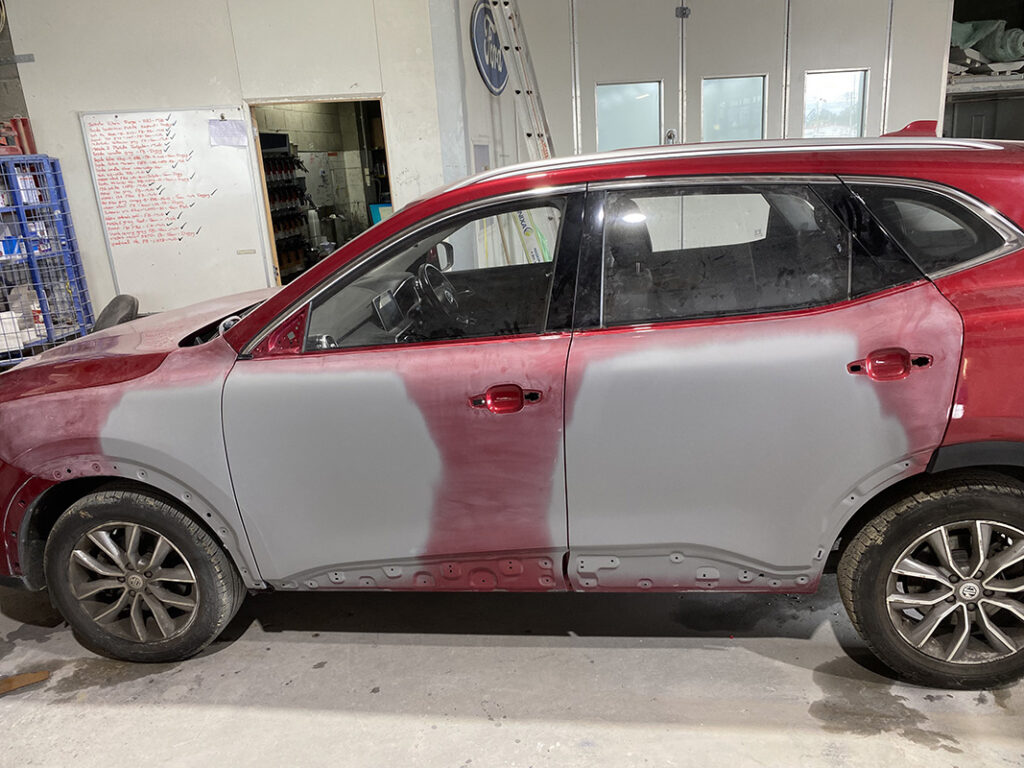 side impact car panel beating